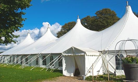 high-quality portable toilets stationed at a wedding, meeting the needs of guests throughout the outdoor reception in The Village